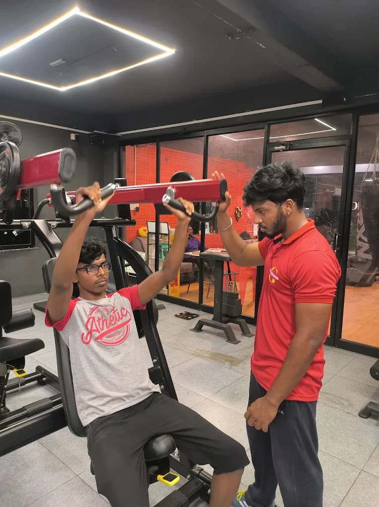 Trainer helping trainee